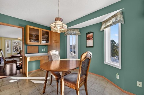 206 Arbour Cliff Close Nw, Calgary, AB - Indoor Photo Showing Dining Room