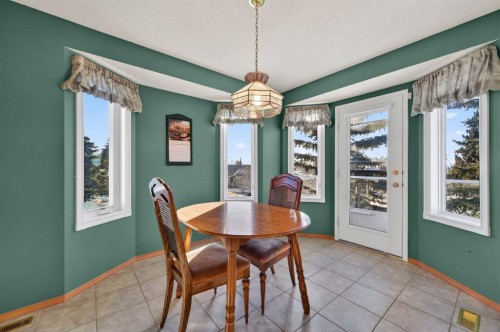 206 Arbour Cliff Close Nw, Calgary, AB - Indoor Photo Showing Dining Room