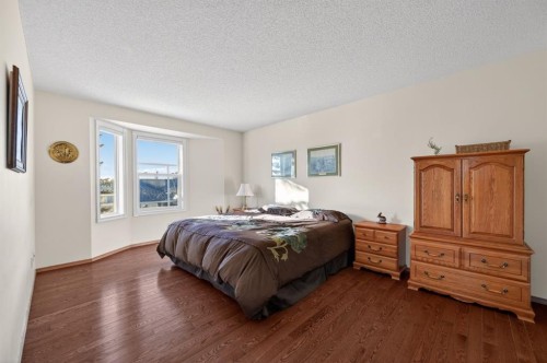 206 Arbour Cliff Close Nw, Calgary, AB - Indoor Photo Showing Bedroom