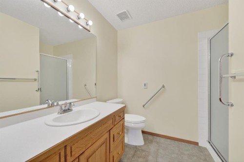 206 Arbour Cliff Close Nw, Calgary, AB - Indoor Photo Showing Bathroom