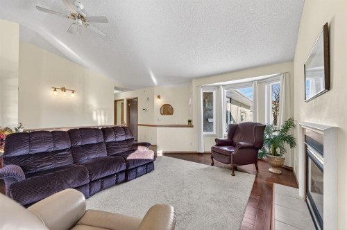 206 Arbour Cliff Close Nw, Calgary, AB - Indoor Photo Showing Living Room