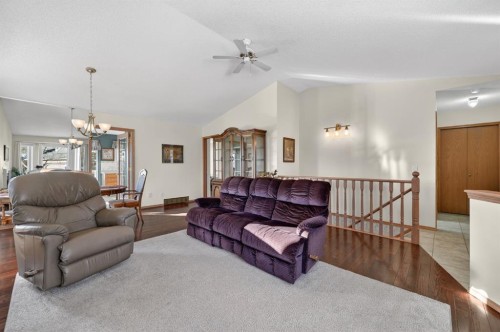 206 Arbour Cliff Close Nw, Calgary, AB - Indoor Photo Showing Living Room