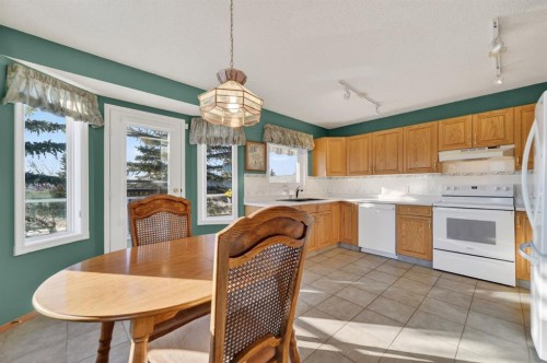 206 Arbour Cliff Close Nw, Calgary, AB - Indoor Photo Showing Dining Room
