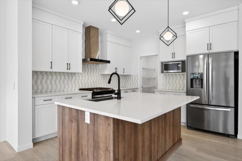 392 Carringvue Place Nw, Calgary, AB - Indoor Photo Showing Kitchen With Stainless Steel Kitchen With Upgraded Kitchen