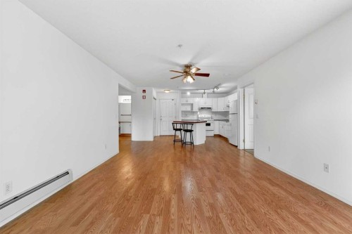 210-165 Manora Place Ne, Calgary, AB - Indoor Photo Showing Other Room