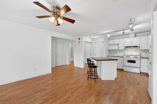 210-165 Manora Place Ne, Calgary, AB - Indoor Photo Showing Kitchen
