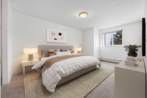 210-165 Manora Place Ne, Calgary, AB - Indoor Photo Showing Bedroom