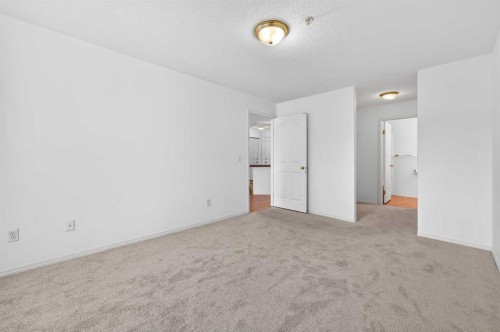 210-165 Manora Place Ne, Calgary, AB - Indoor Photo Showing Other Room