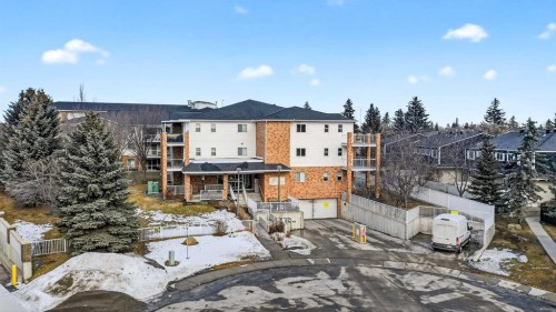210-165 Manora Place Ne, Calgary, AB - Outdoor With Balcony