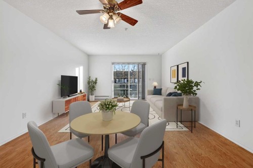 210-165 Manora Place Ne, Calgary, AB - Indoor Photo Showing Dining Room