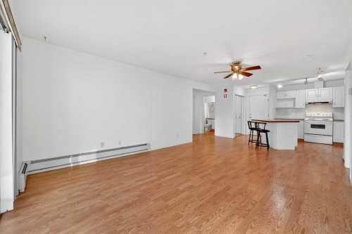 210-165 Manora Place Ne, Calgary, AB - Indoor Photo Showing Kitchen