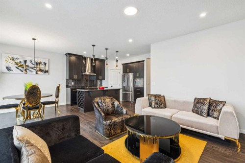 86 Creekside Way Sw, Calgary, AB - Indoor Photo Showing Living Room