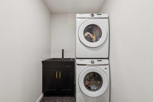 86 Creekside Way Sw, Calgary, AB - Indoor Photo Showing Laundry Room