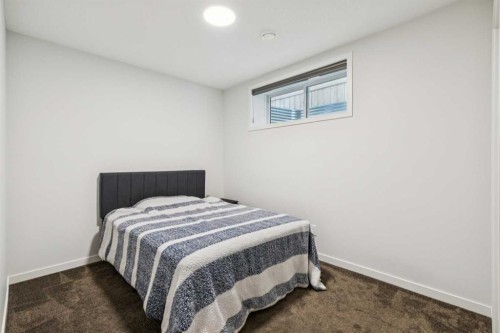 86 Creekside Way Sw, Calgary, AB - Indoor Photo Showing Bedroom