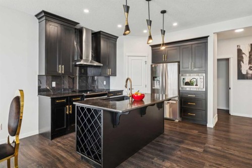 86 Creekside Way Sw, Calgary, AB - Indoor Photo Showing Kitchen With Stainless Steel Kitchen With Upgraded Kitchen