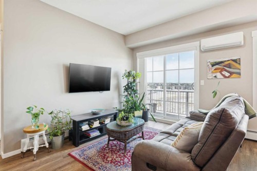 4401-99 Copperstone Park Se, Calgary, AB - Indoor Photo Showing Living Room
