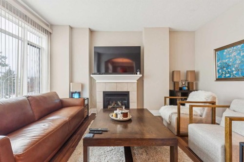 305-4 14 Street Nw, Calgary, AB - Indoor Photo Showing Living Room With Fireplace