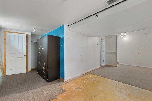 61 Applemont Place Se, Calgary, AB - Indoor Photo Showing Other Room