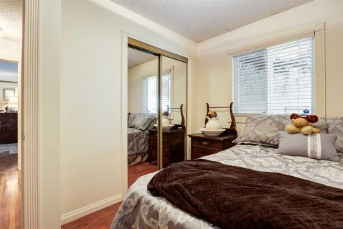 21 Midridge Green Se, Calgary, AB - Indoor Photo Showing Bedroom