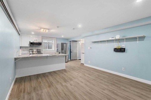 380 Maddock Crescent Ne, Calgary, AB - Indoor Photo Showing Other Room