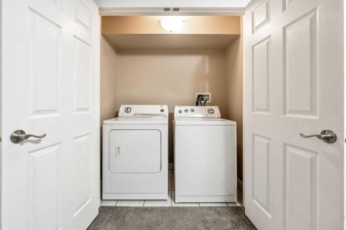 123 Elgin Meadows View Se, Calgary, AB - Indoor Photo Showing Laundry Room