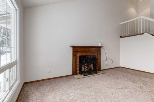 60 Bedford Circle Ne, Calgary, AB - Indoor With Fireplace