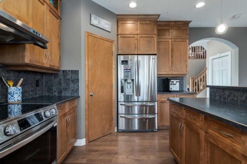 227 Tuscany Glen Park Nw, Calgary, AB - Indoor Photo Showing Kitchen With Stainless Steel Kitchen