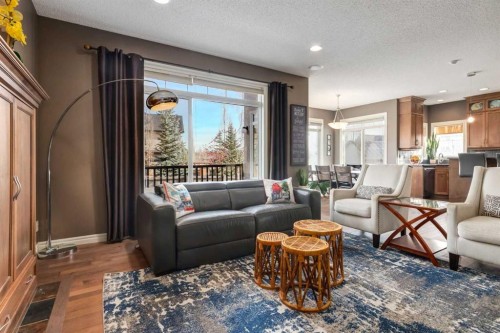 227 Tuscany Glen Park Nw, Calgary, AB - Indoor Photo Showing Living Room