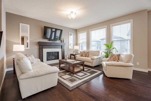 355 Evanston Way Nw, Calgary, AB - Indoor Photo Showing Living Room With Fireplace