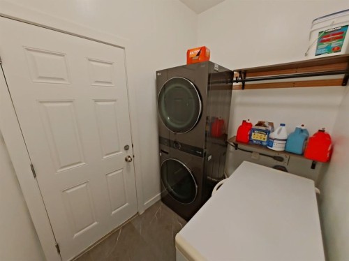 656 Cranston Drive Se, Calgary, AB - Indoor Photo Showing Laundry Room