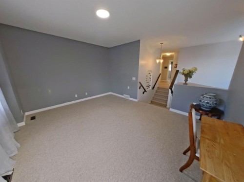 656 Cranston Drive Se, Calgary, AB - Indoor Photo Showing Other Room