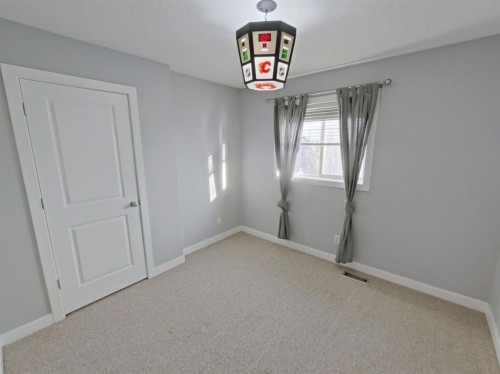 656 Cranston Drive Se, Calgary, AB - Indoor Photo Showing Other Room