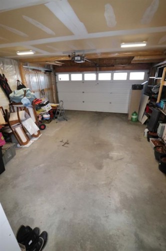 656 Cranston Drive Se, Calgary, AB - Indoor Photo Showing Garage