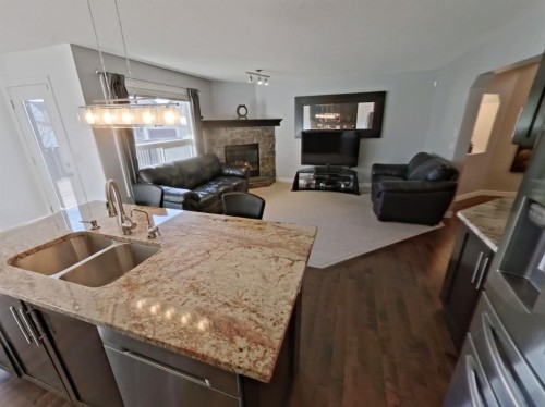 656 Cranston Drive Se, Calgary, AB - Indoor With Fireplace
