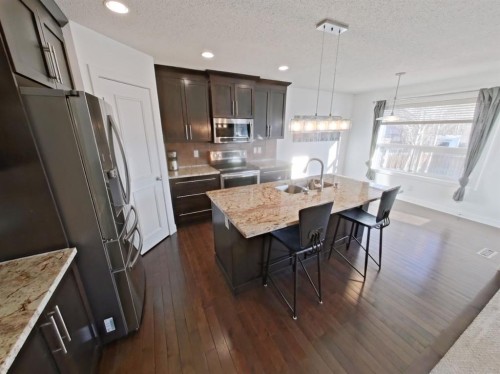 656 Cranston Drive Se, Calgary, AB - Indoor Photo Showing Kitchen With Upgraded Kitchen