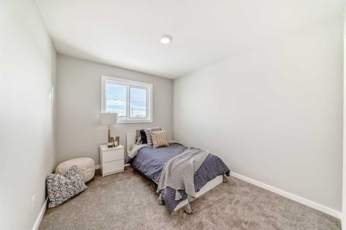 270 Sora Way Se, Calgary, AB - Indoor Photo Showing Bedroom