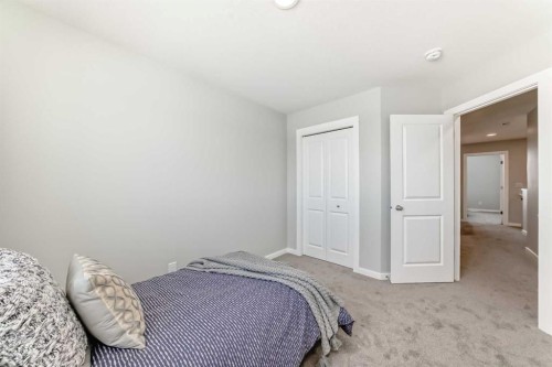 270 Sora Way Se, Calgary, AB - Indoor Photo Showing Bedroom