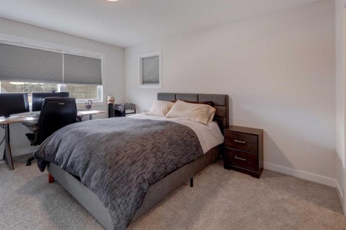 1601 Chinook Gate Drive Sw, Airdrie, AB - Indoor Photo Showing Bedroom