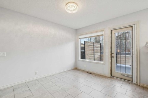 305 Tuscany Vista Road Nw, Calgary, AB - Indoor Photo Showing Other Room