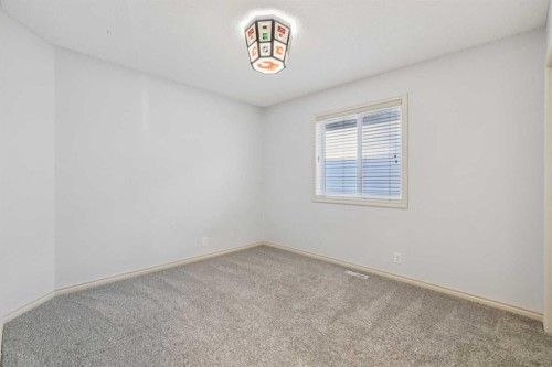 305 Tuscany Vista Road Nw, Calgary, AB - Indoor Photo Showing Other Room