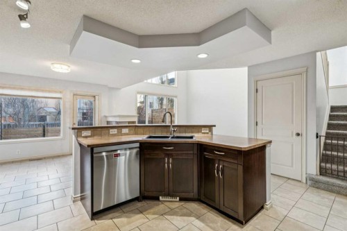 305 Tuscany Vista Road Nw, Calgary, AB - Indoor Photo Showing Kitchen With Double Sink