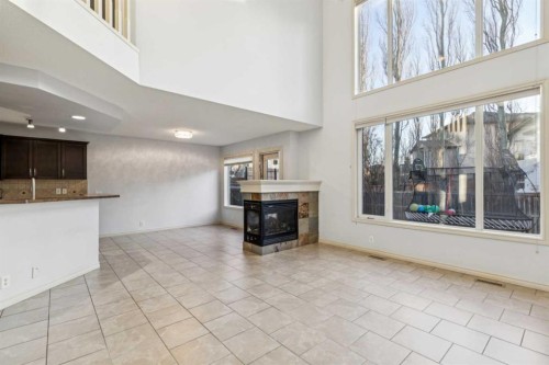 305 Tuscany Vista Road Nw, Calgary, AB - Indoor With Fireplace
