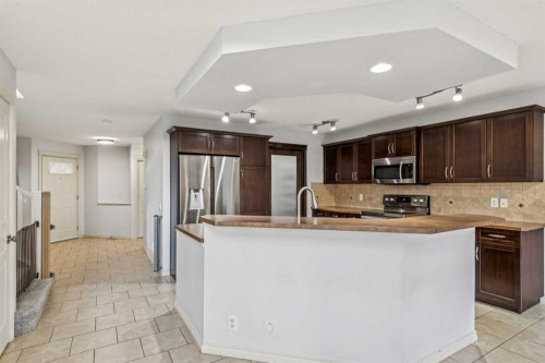 305 Tuscany Vista Road Nw, Calgary, AB - Indoor Photo Showing Kitchen