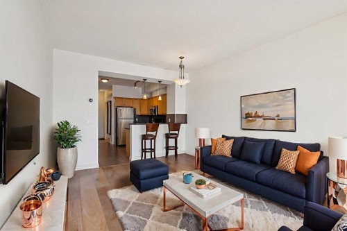 15-117 Rockyledge View Nw, Calgary, AB - Indoor Photo Showing Living Room