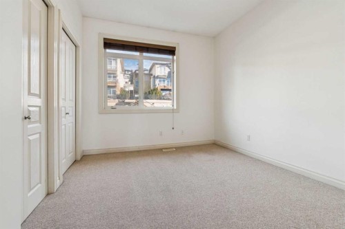 15-117 Rockyledge View Nw, Calgary, AB - Indoor Photo Showing Other Room