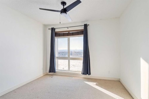 15-117 Rockyledge View Nw, Calgary, AB - Indoor Photo Showing Other Room