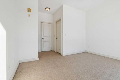 15-117 Rockyledge View Nw, Calgary, AB - Indoor Photo Showing Other Room