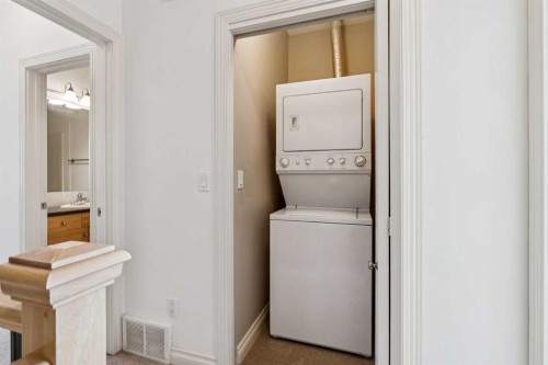 15-117 Rockyledge View Nw, Calgary, AB - Indoor Photo Showing Laundry Room