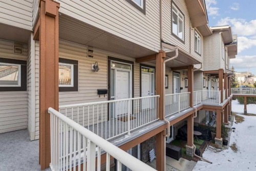 15-117 Rockyledge View Nw, Calgary, AB - Outdoor With Exterior