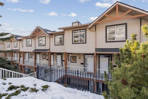 15-117 Rockyledge View Nw, Calgary, AB - Outdoor With Facade